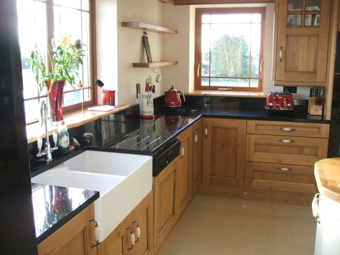 A oak kitchen with black marble.jpg